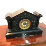 A Victorian slate mantel clock detailed with bronze effect Greek musicians, Centurion and maiden off