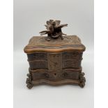 A Beautifully made 19th century Black Forest jewel box. Detailed with hand carvings of flowers and