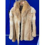 A vintage ladies unusual fur coat.