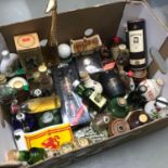 A Box containing a selection of mixed whisky miniatures and porcelain whisky miniatures to include