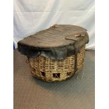 Antique Scottish fish wife basket. An old washing basin together with a hand weaved fish carry