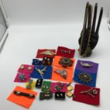 A Quantity of vintage costume jewellery brooches and 9ct gold earrings. [Four pairs of 9ct gold
