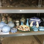 A shelf of porcelain Collectables to include sylvac, Art Deco parrot figures, Copeland blue and