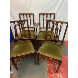 A Set of four dining chairs and two carvers