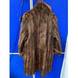 A Vintage ladies fur long coat.