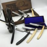 A Collection of 7 antique cut throat razors together with a vintage cigar box.