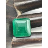A 1950's man made Emerald gem stone. Measures 1.4x1.3x0.8cm
