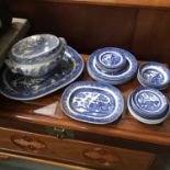 A Lot of Old Willow Pattern dinner wares to include vintage and Antique. Includes large