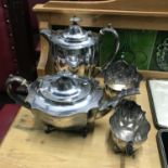 A Four piece antique E.P Tea/ coffee service. Engraved to the front of the tea pot 'A Parting gift