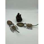 A Pair of Scorpion handle berry spoons together with a Japanese lidded pot.