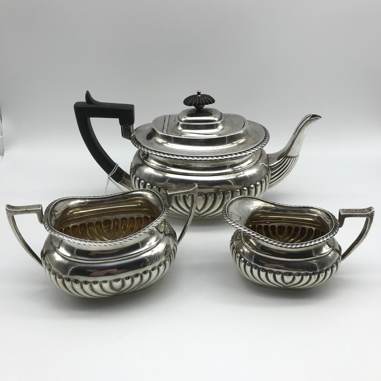 A London silver three piece tea set made by Horace Woodward & Co Ltd, dated 1906. [weighs 683grams]