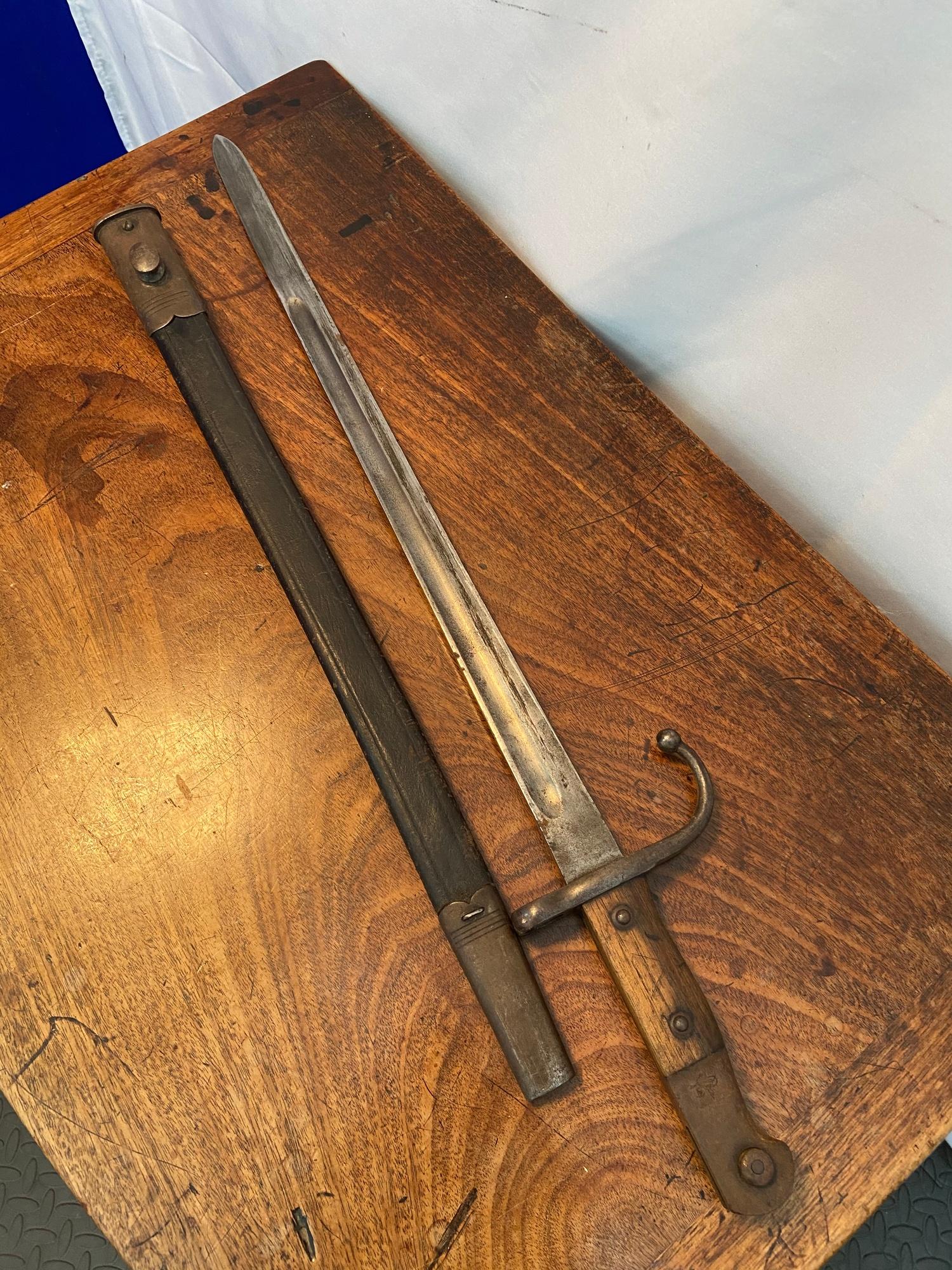 Model 1890 Turkish Mauser Bayonet with scabbard. Stamped with Turkish writing to the hilt of the