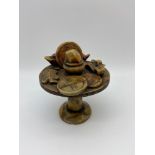 A 20th century Chinese hard stone revolving table sculpture. [12cm in height]