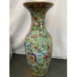 A Large 19th century Chinese Celadon famille rose ornate vase. Detailed with figures, flies,