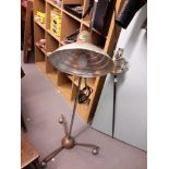 An unsual vintage Hanova Lamp with rise and fall function on three spider legs with period caster