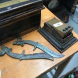 A Very unique Art Deco table top triple cigar cutter together with two Bronze/ brass letter openers.