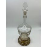 Early 1900's French etched decanter fitted with a plated musical base. [32cm in height]