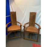 Two unusual antique style high back carver chairs.
