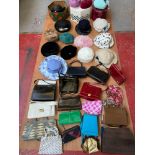 A collection of vintage dress/evening hats together with a collection of vintage clutch bags and