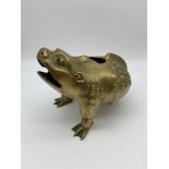 A 18th/ 19th century Chinese solid brass three footed toad incense burner. Detailed with black