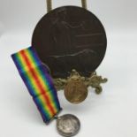 A WW1 War and Victory medal, Together with a Death plaque all belonging to 3373 GNR. A. BINNIE. R.A.