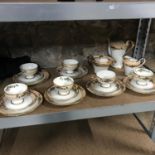 An 18 piece Hutschenreuther Bavaria tea set together with matching coffee pot, sugar and cream by