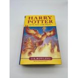 A 1st edition Harry Potter and the order of the phoenix hard back book. Printed 2003. ISBN 0 7475
