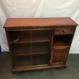 A Vintage Old Charm Bookcase unit. Detailed with linen press relief door, Acorn design handles and