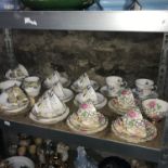 A Shelf of collectables tea sets to include names such as Royal Stafford, Colclough & Clare.