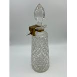 A 19th century Betjemann's crystal decanter with fitted lock. Engraved to the lock 'W.N.M FROM D.