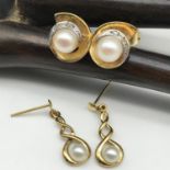 Two pairs of 9ct gold and genuine pearl set earrings. The larger pair of earrings is set with