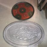 A Large Indian ornate serving platter/ tray together with a hand painted floral design serving tray.