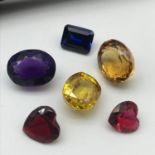 A Lot of vintage 1950's Man made gem stones to include Sapphire, Citrine, Amethyst and three glass