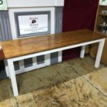 An antique solid timber narrow dining table, produced by M.F.M.A Holt Oconto. Measures 76.5x201.