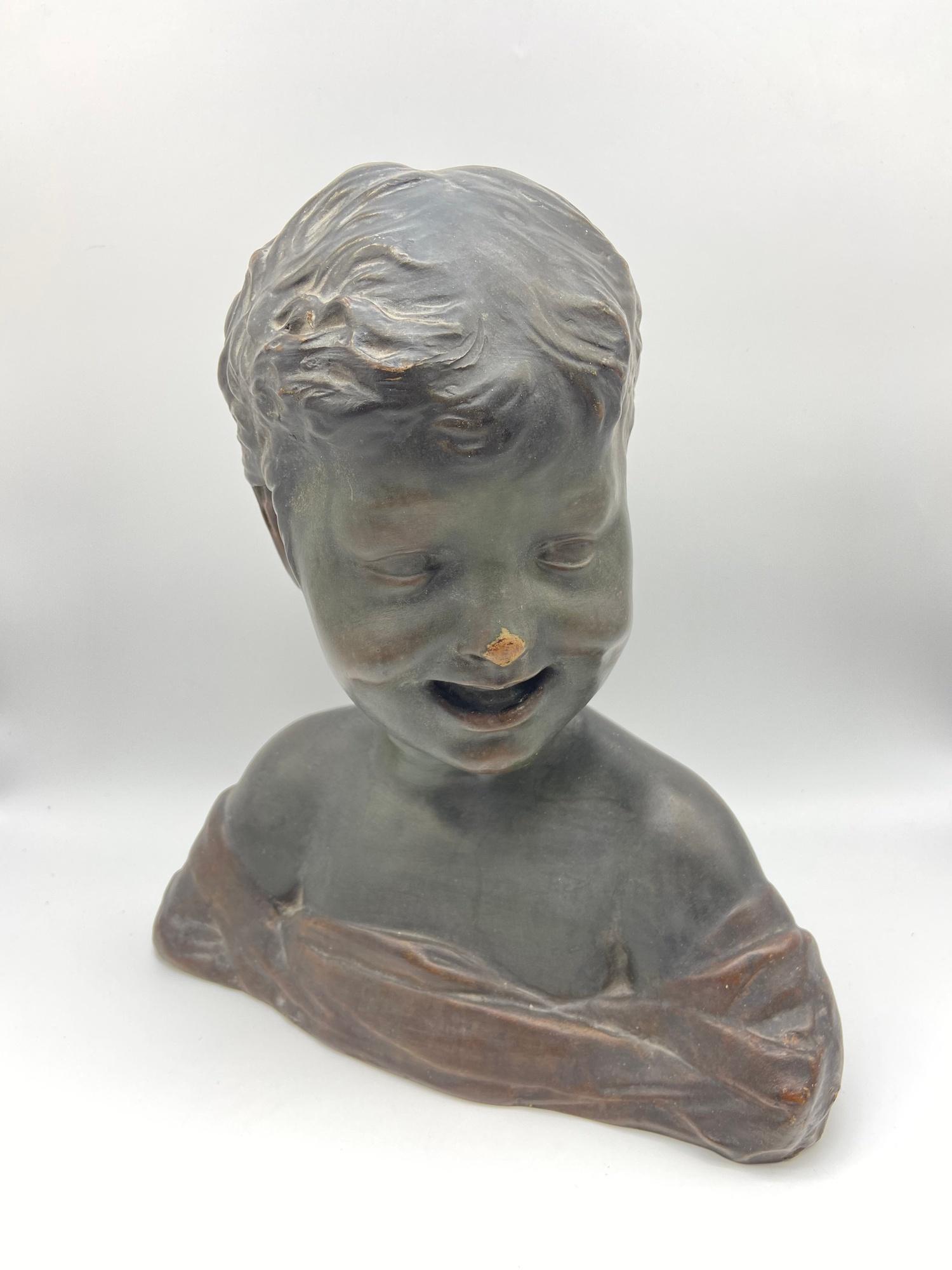 Antique Plaster Cold painted style Bust of a Laughing Boy, Continental, late 19th/early 20th