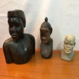 Two antique wooden African carved busts together with a hand carved African stone bust.