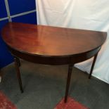 A Pair of Georgian Mahogany Demi Lune Serving tables. Each Measure 86146x73cm