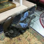 A Contemporary bronzed effect and Tiffany style dolphin coffee table. Designed with light up areas