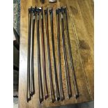 A Collection of 9 antique and vintage violin bows to include Nach Tourte bow.