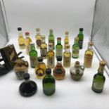 A Collection of vintage Whisky miniatures to include Tobermory, Chivas, Atholl Brose, Irish Mist,