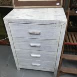 A contemporary white wash 4 drawer chest. Measures 100x70x45cm