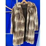 A Ladies vintage fur long coat.