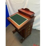 Antique Davenport writing bureau. Designed with four drawers to the side, Other side has four