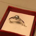 A Beautiful example of a ladies 18ct white gold and Diamond engagement ring. Centre round