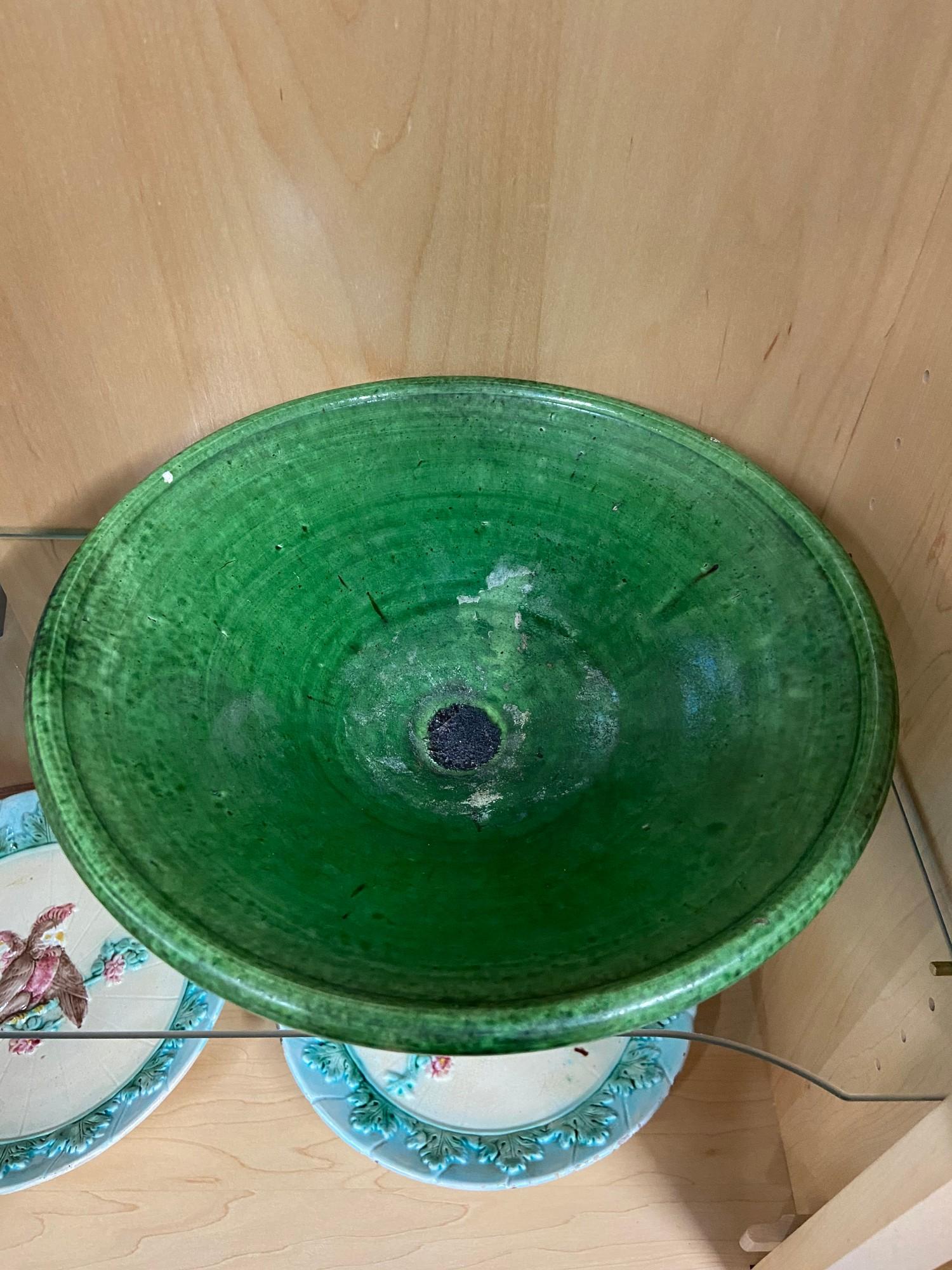 A 19th century green glazed bowl with impressed 'Holland' mark. [28.5cm diameter] - Image 2 of 3