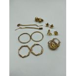 A Lot of seven pairs of 9ct gold earrings. [Total weight 5.06 Grams]