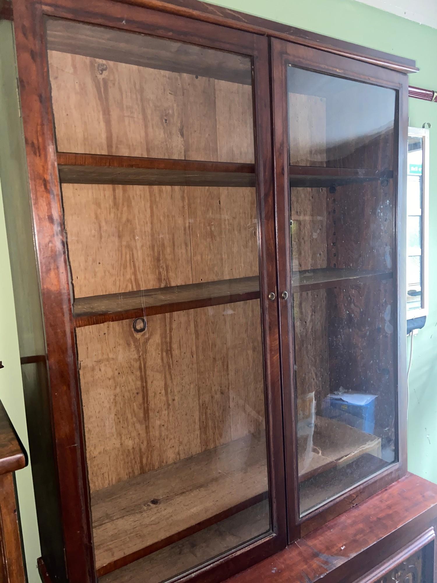 A Victorian Mahogany two piece library bookcase. Designed with glass double doors. - Image 2 of 4