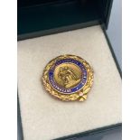 A 9ct gold and blue enamel International Correspondence Schools Ltd fob [2.99 grams]