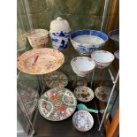 Two Shelves of 19th/ 20th century Chinese and Japanese porcelain wares.