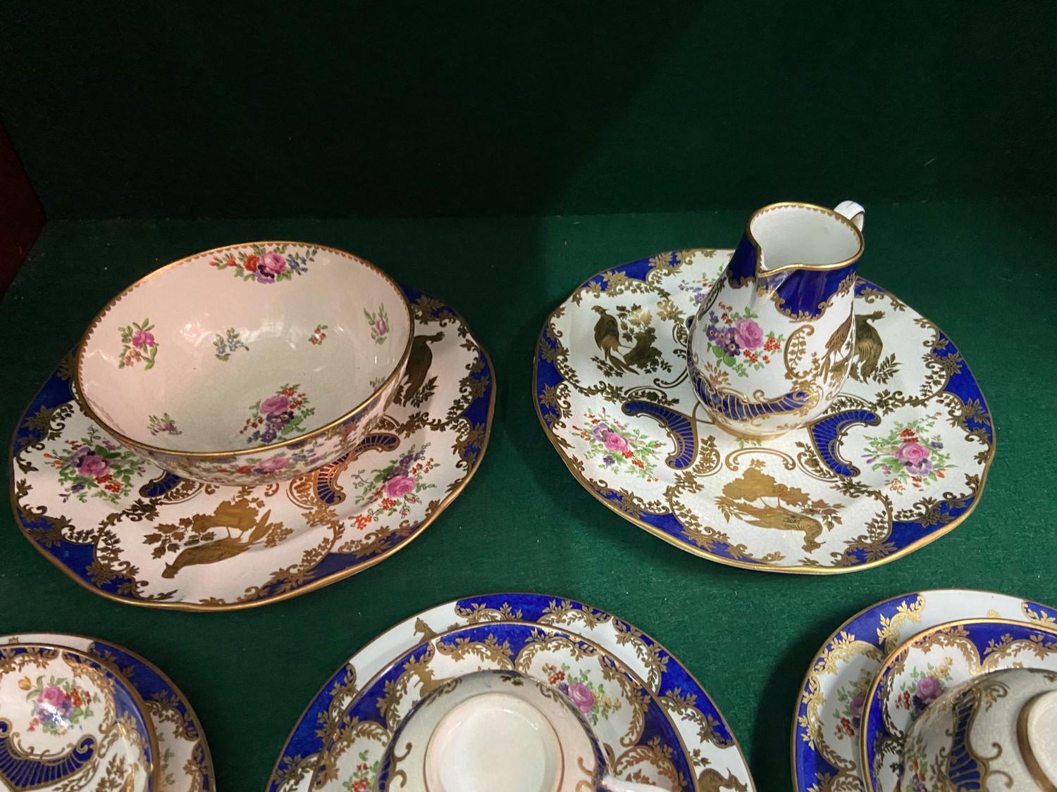 A 19th century Booths Gilt peacock design part tea set [22 pieces] - Image 2 of 7